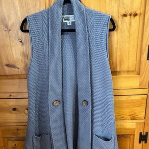 Habitat gray knit vest, with decorative buttons. Adds a bit of warmth and style